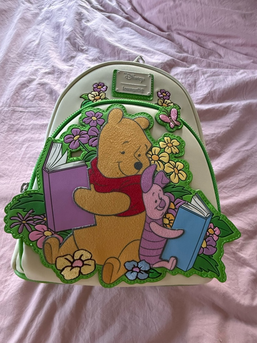 Loungefly Disney’s Winnie the Pooh & Piglet Floral Reading Backpack